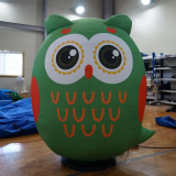 Green owl with bright eyes inflatable