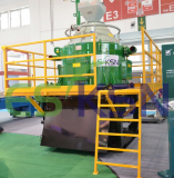 Drilling waste management vertical centrifuge