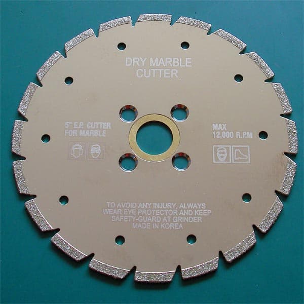 Electroplated Dry Blade ( "V" Slot ) made in Korea Designed for clean & smooth cutting with features of excellent cutting performance without chipping & cracking with the help of advanced electroplated bond along with high diamond density. Ideal for precise cutting for all kinds of marbles as well as for other soft stones. 