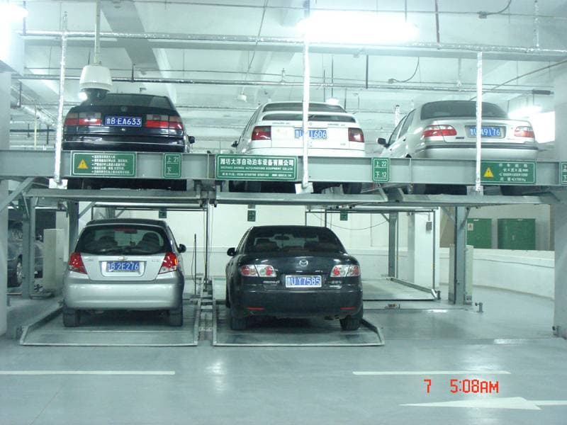 Hydraulic puzzle parking system