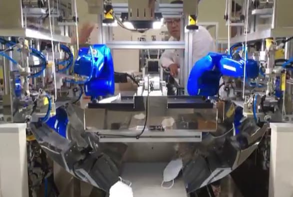 Mask making machine