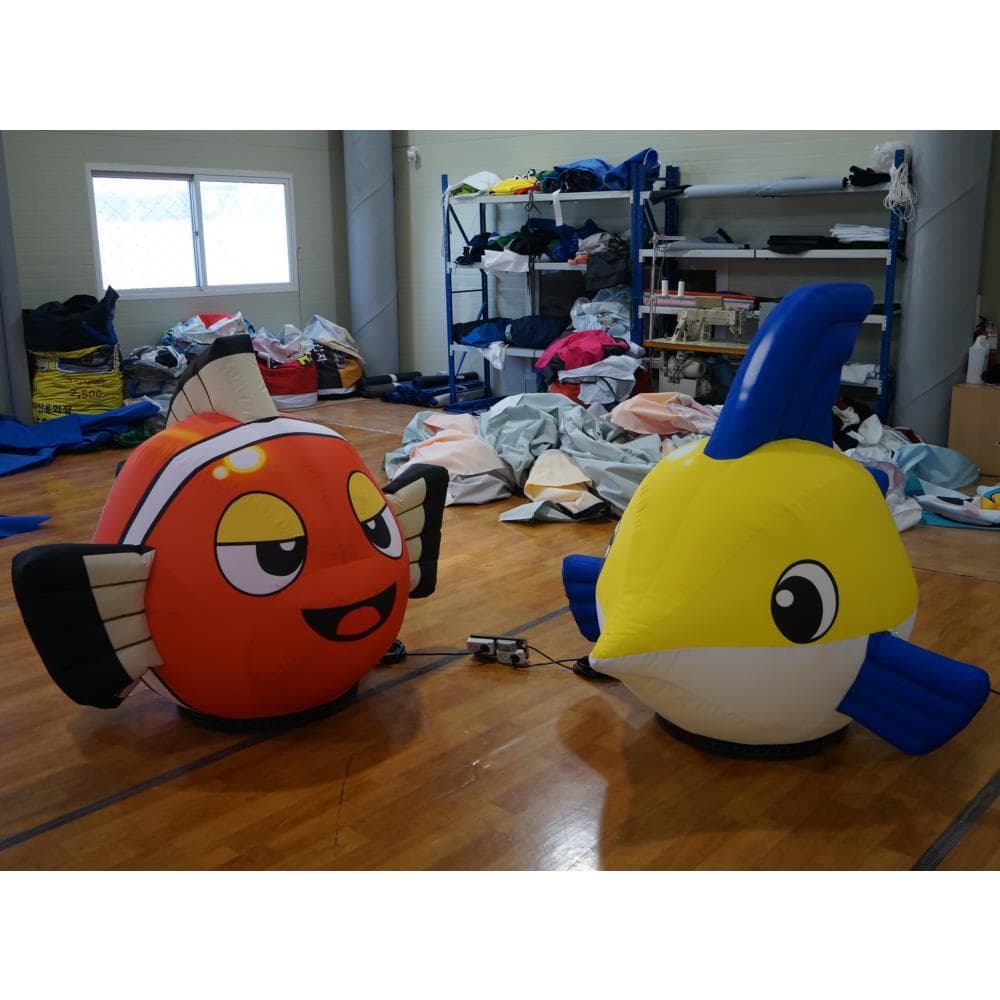 Sleepy red Nemo and Yellow Tang inflatable