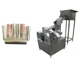 Effervescent tablet wrapping machine