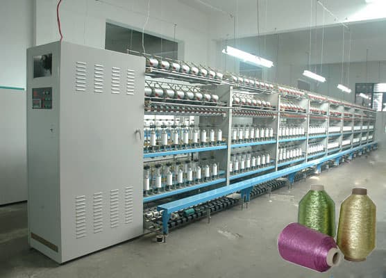 Metallic yarn covering machine